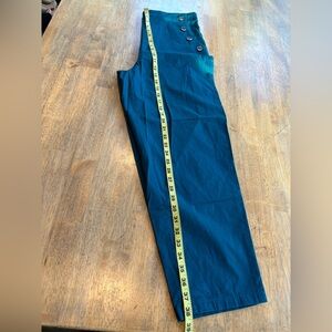 Cute teal colored pants.